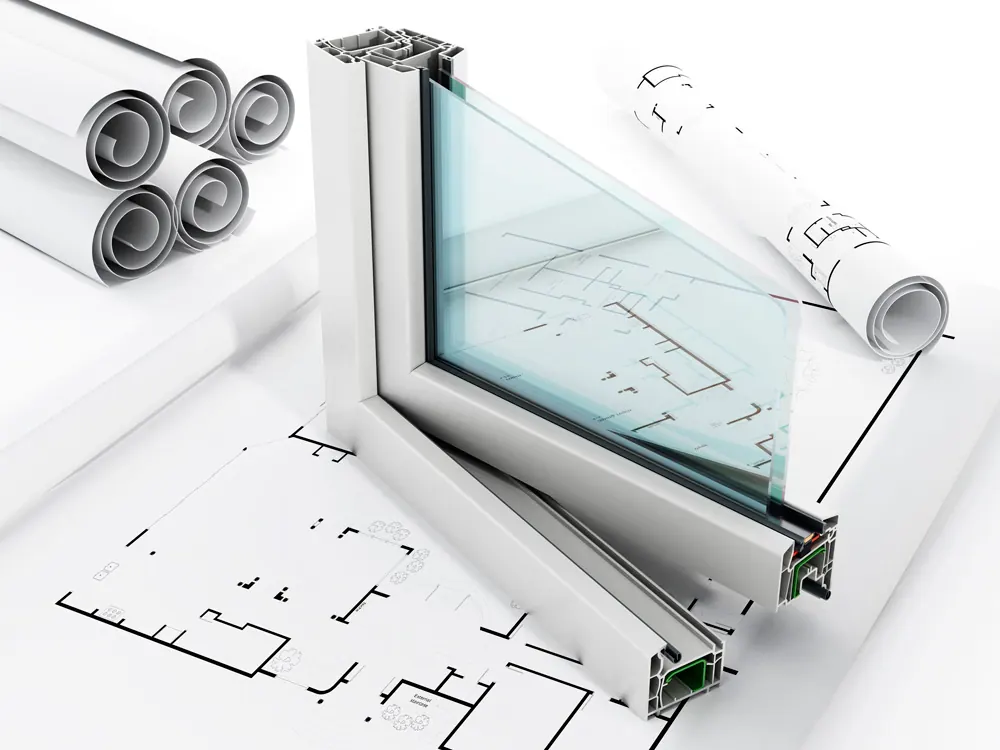 Sección de un perfil de ventana sobre unos planos de obra